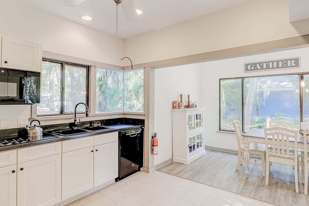 Dog friendly home with an enclosed yard, pool deck, & private pool