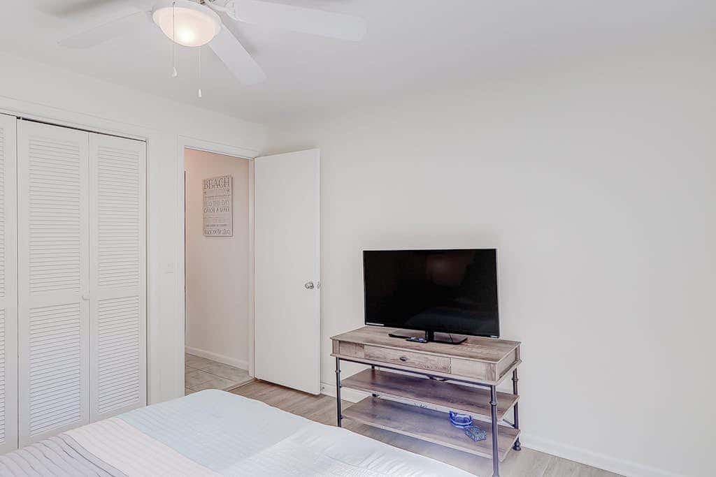 Dog friendly home with an enclosed yard, pool deck, & private pool