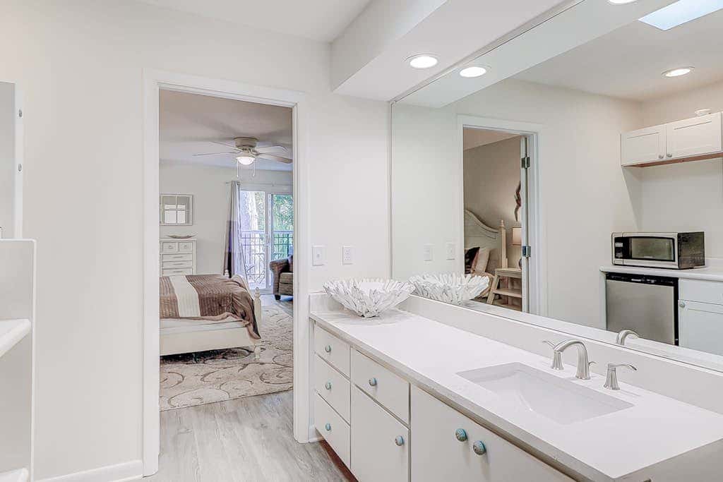 Dog friendly home with an enclosed yard, pool deck, & private pool