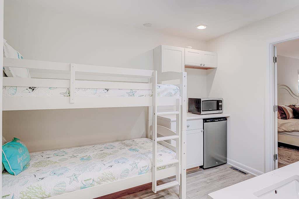 Dog friendly home with an enclosed yard, pool deck, & private pool