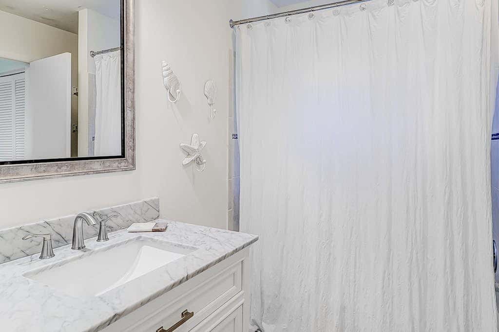 Dog friendly home with an enclosed yard, pool deck, & private pool