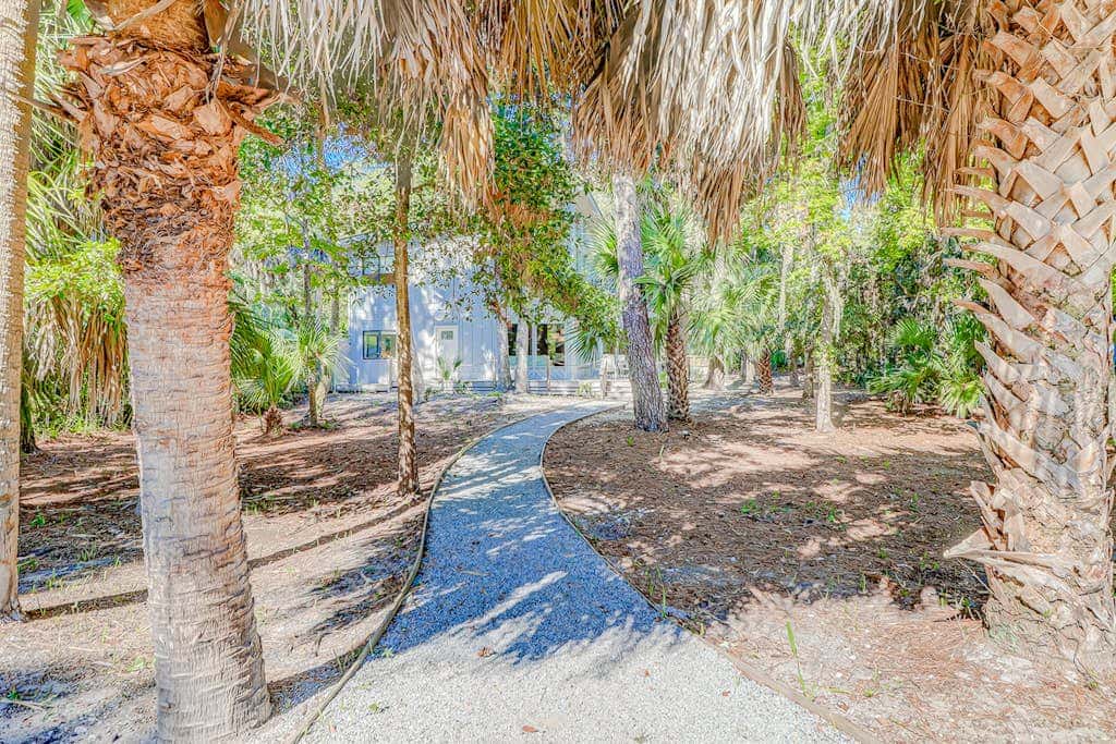 Dog friendly home with an enclosed yard, pool deck, & private pool