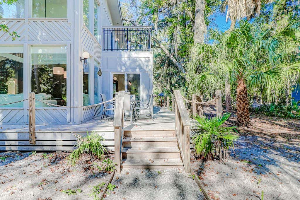 Dog friendly home with an enclosed yard, pool deck, & private pool