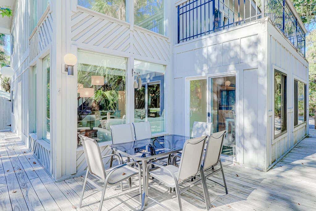 Dog friendly home with an enclosed yard, pool deck, & private pool