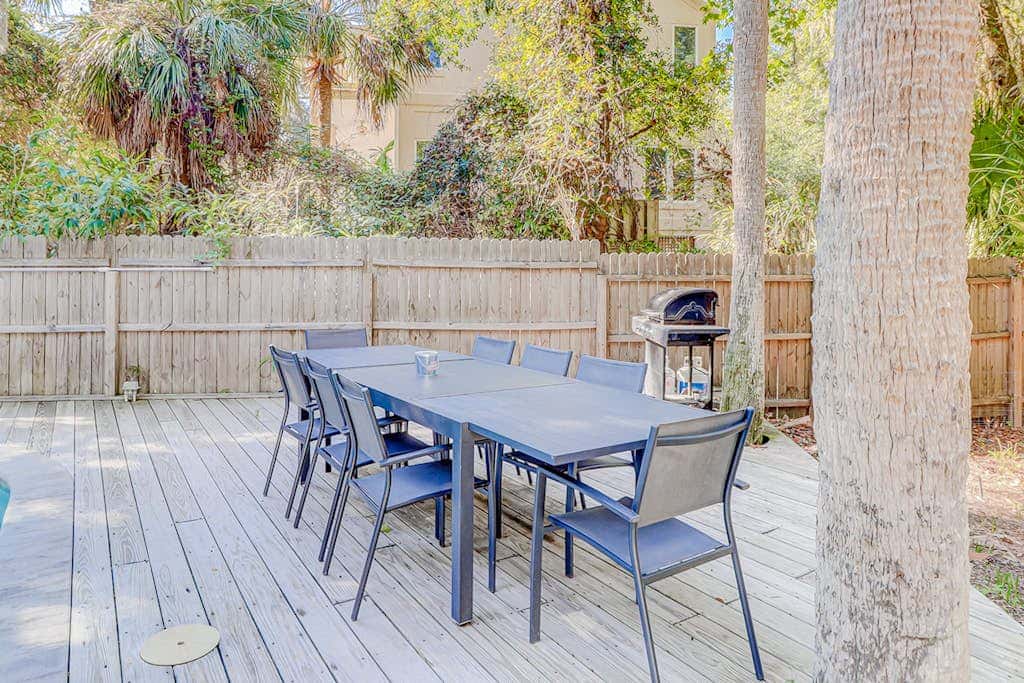 Dog friendly home with an enclosed yard, pool deck, & private pool