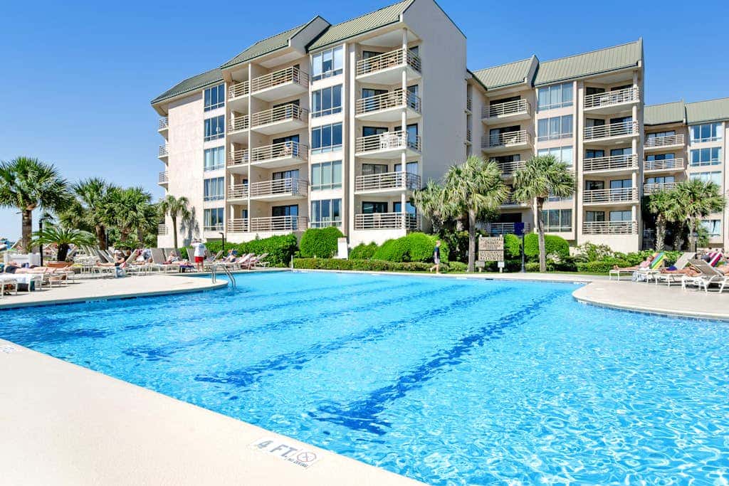 Island condo with beach access and balcony view  close to golf