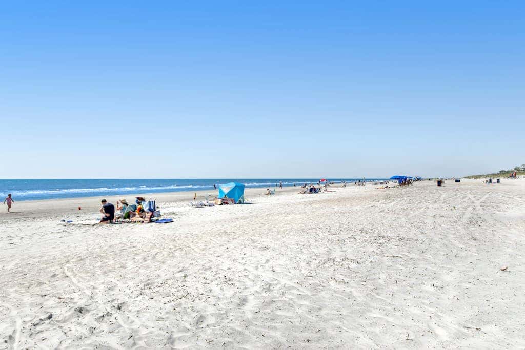 Island condo with beach access and balcony view  close to golf