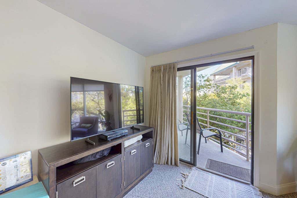 Island condo with beach access and balcony view  close to golf