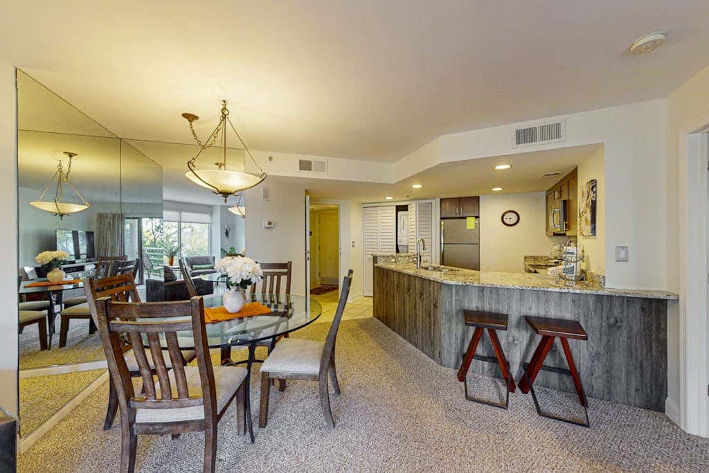 Island condo with beach access and balcony view  close to golf