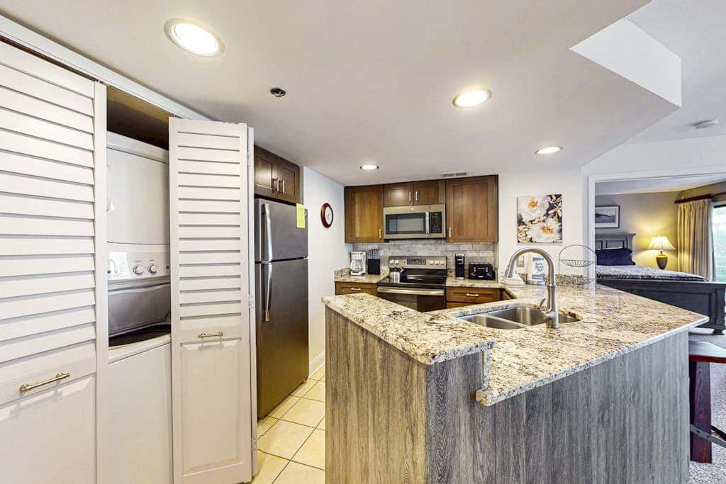 Island condo with beach access and balcony view  close to golf