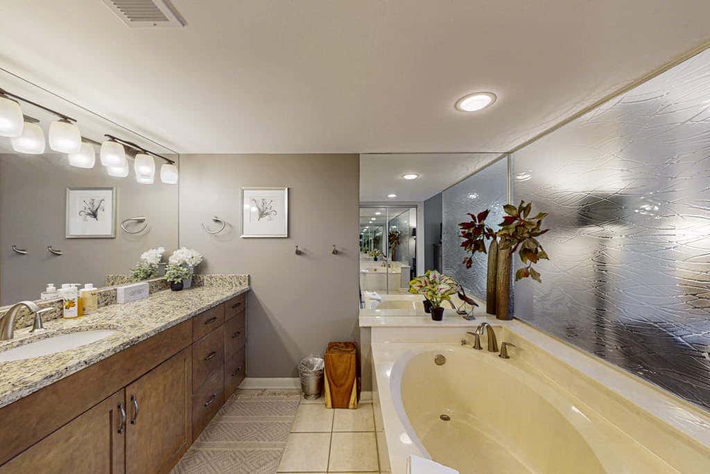 Island condo with beach access and balcony view  close to golf