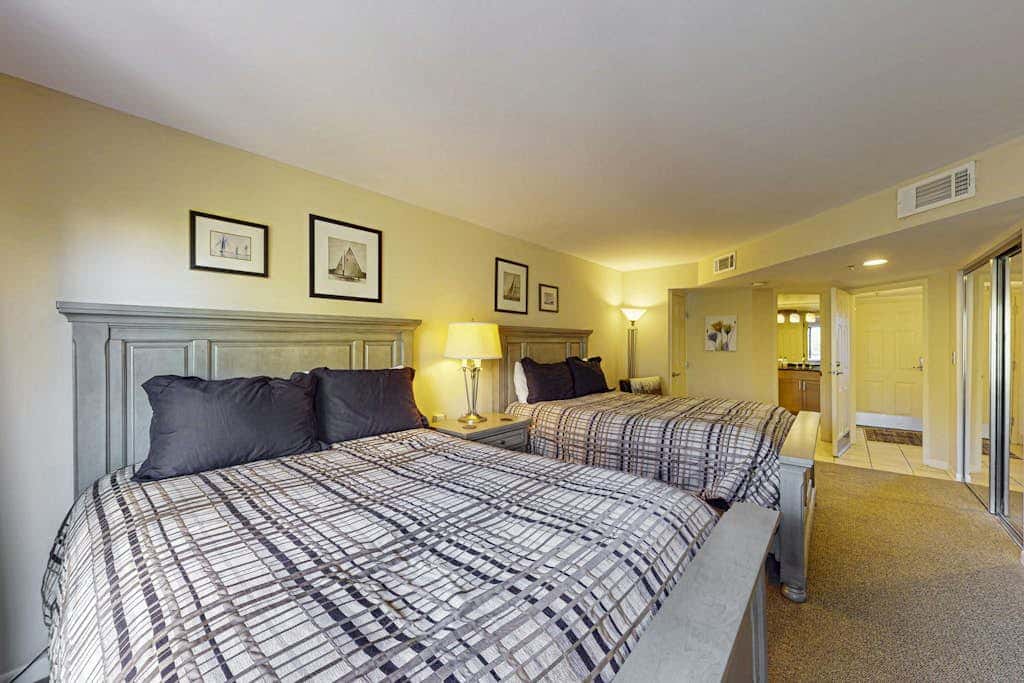 Island condo with beach access and balcony view  close to golf