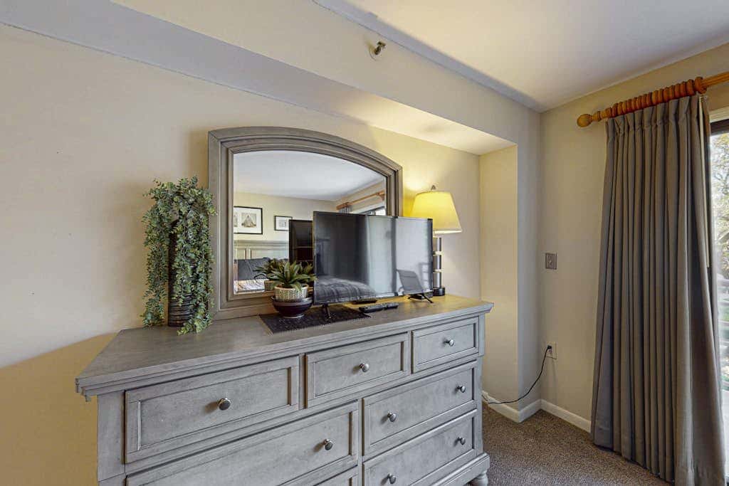 Island condo with beach access and balcony view  close to golf