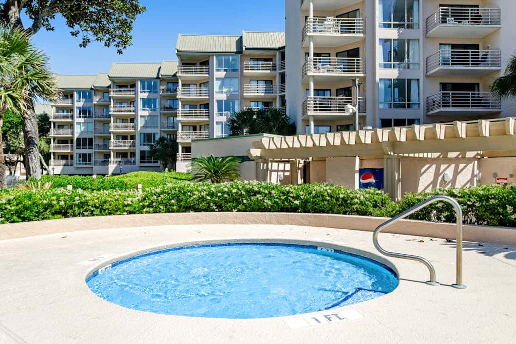 Island condo with beach access and balcony view  close to golf