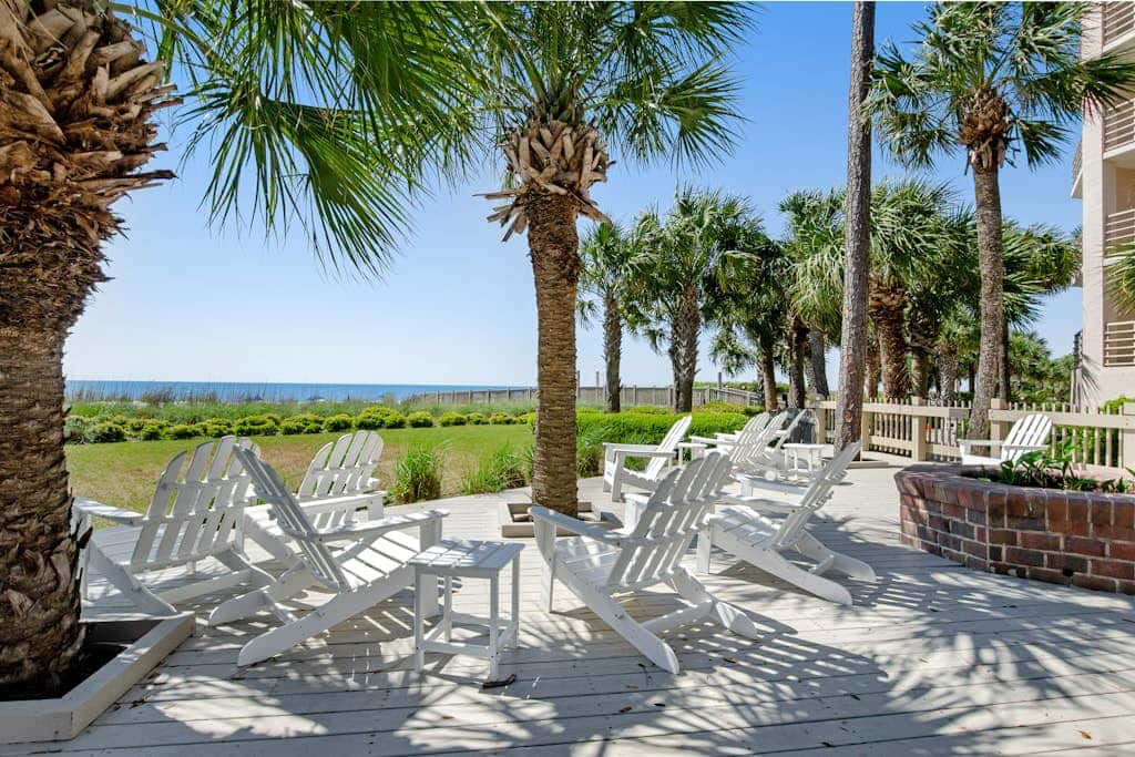 Island condo with beach access and balcony view  close to golf