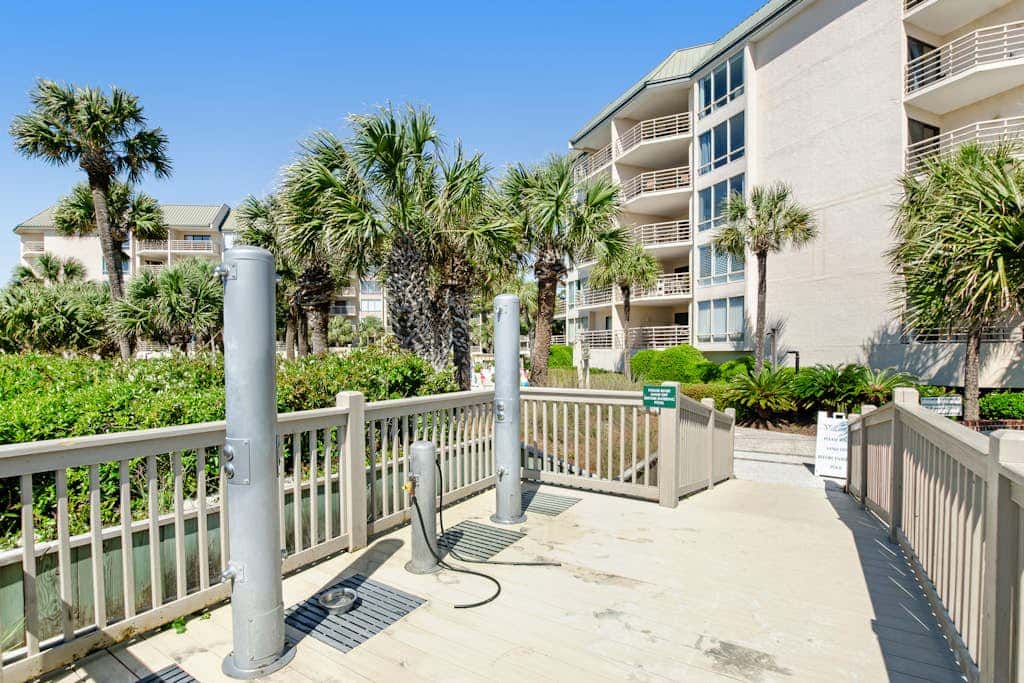 Island condo with beach access and balcony view  close to golf