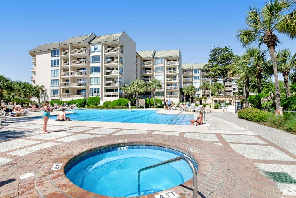 Island condo with beach access and balcony view  close to golf