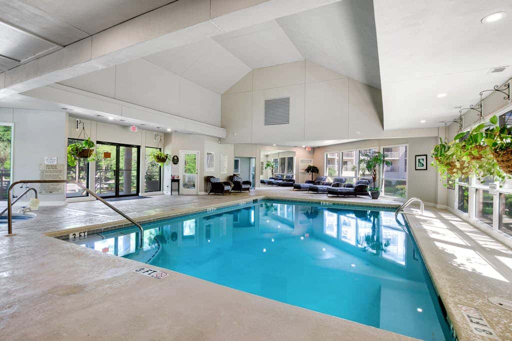 Island condo with beach access and balcony view  close to golf