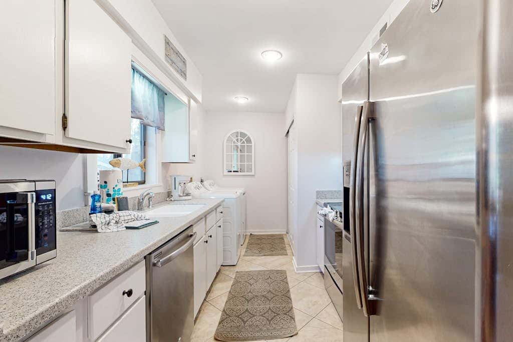 Dog friendly villa with lagoon views & an updated interior near beach & pools