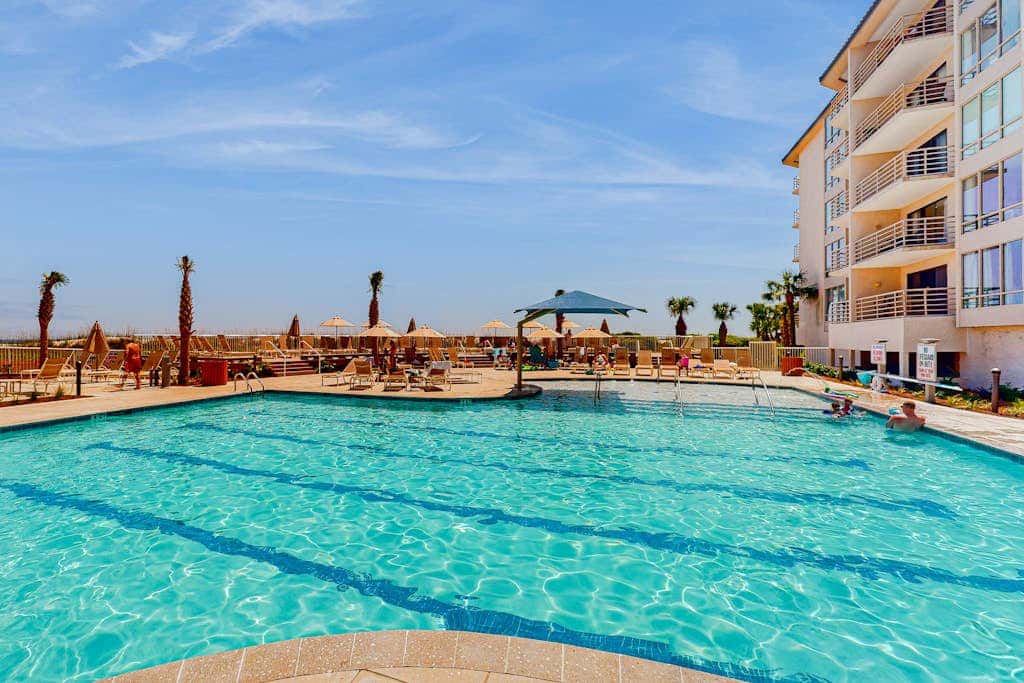 Sunny condo with ocean view balcony & beach access
