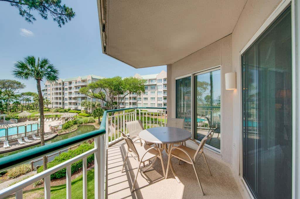 Beach dream with balcony view & shared pool, just steps away from the beach