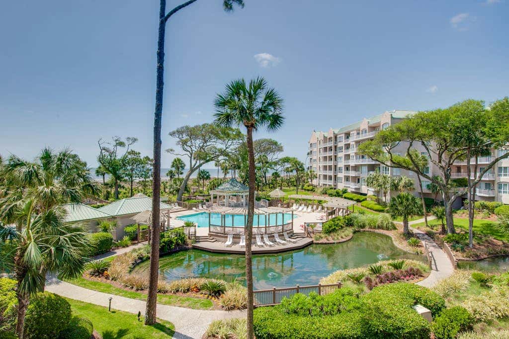 Beach dream with balcony view & shared pool, just steps away from the beach