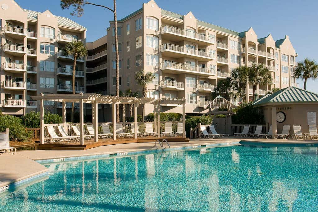 Beach dream with balcony view & shared pool, just steps away from the beach
