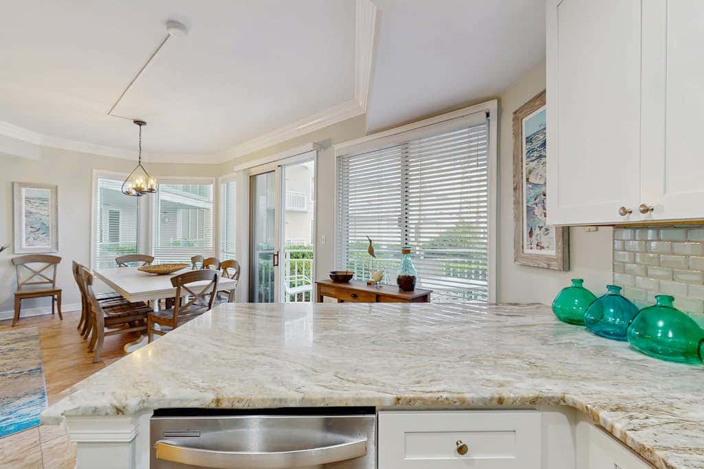 Oceanfront condo with pools, hot tubs, WiFi, washer, dryer, & central AC