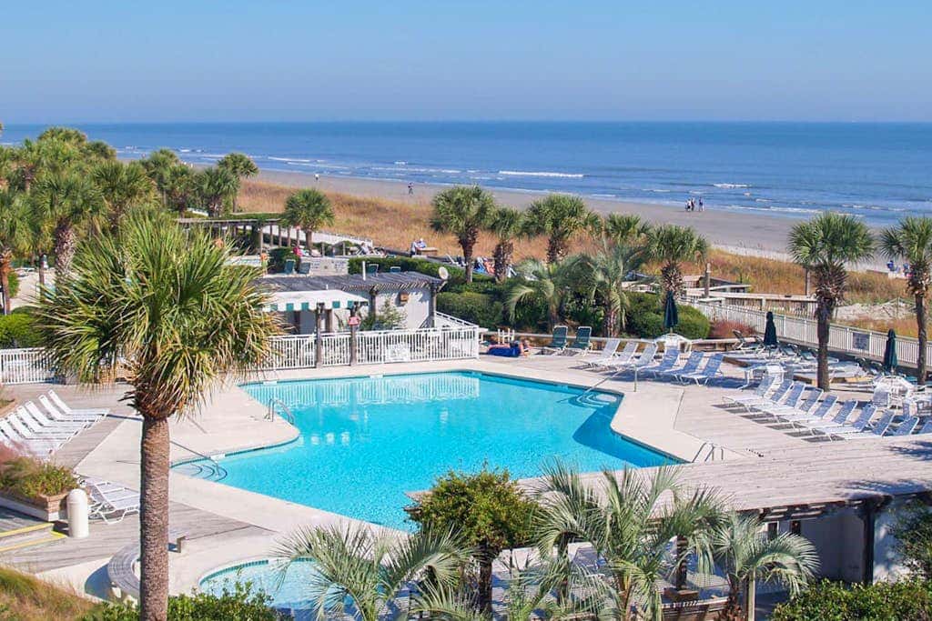Oceanfront condo with pools, hot tubs, WiFi, washer, dryer, & central AC