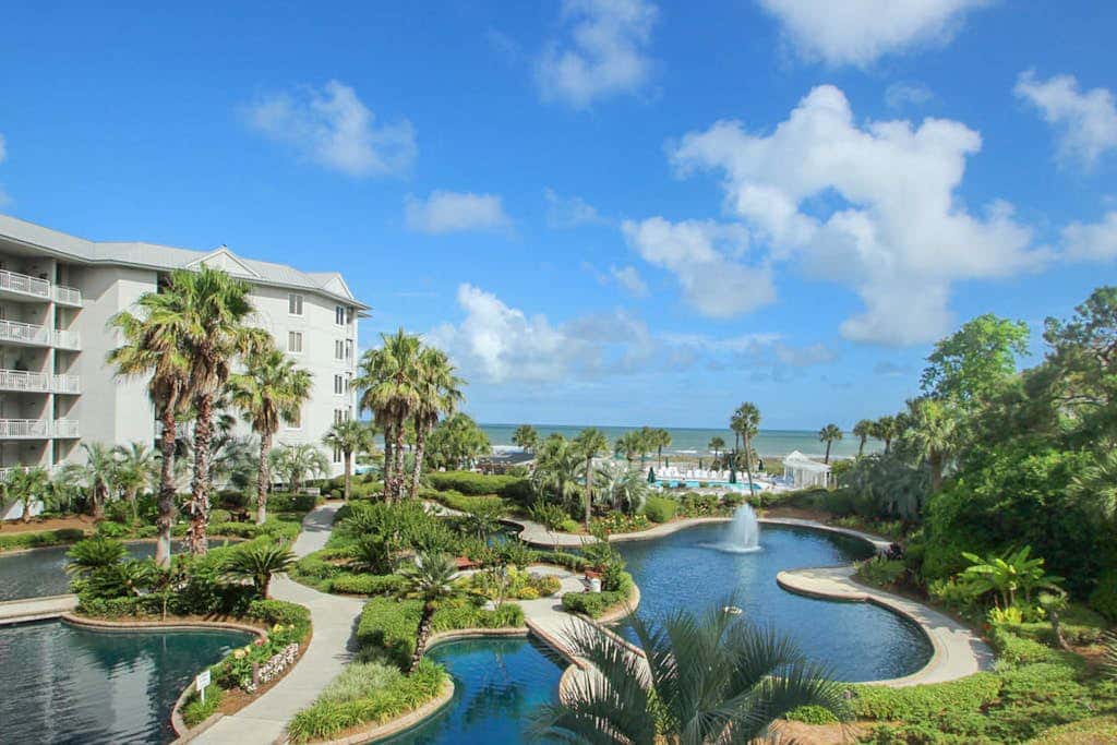 Oceanfront condo with pools, hot tubs, WiFi, washer, dryer, & central AC
