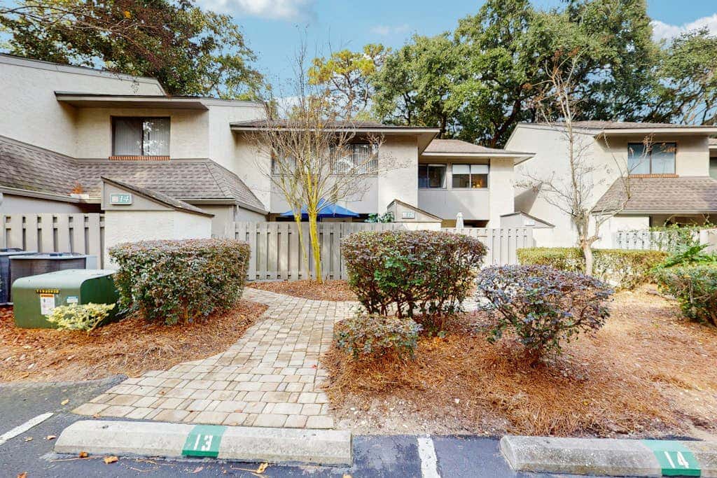 Dog Friendly Condo with Fast WiFi, a Patio, & Shared Pool Walk to the Beach
