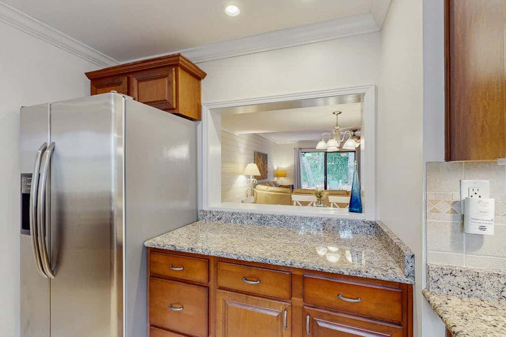 Dog Friendly Condo with Fast WiFi, a Patio, & Shared Pool Walk to the Beach
