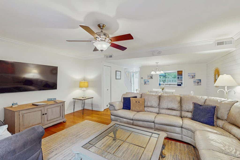 Dog Friendly Condo with Fast WiFi, a Patio, & Shared Pool Walk to the Beach