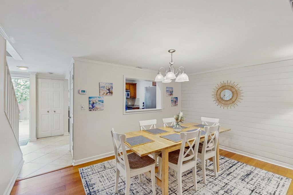 Dog Friendly Condo with Fast WiFi, a Patio, & Shared Pool Walk to the Beach