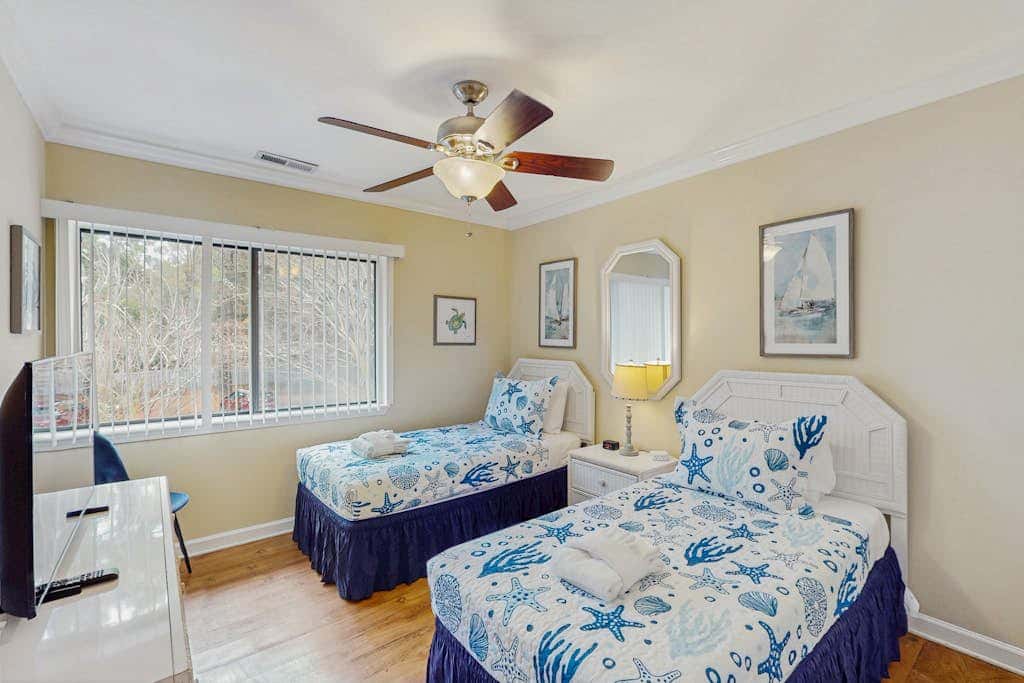 Dog Friendly Condo with Fast WiFi, a Patio, & Shared Pool Walk to the Beach