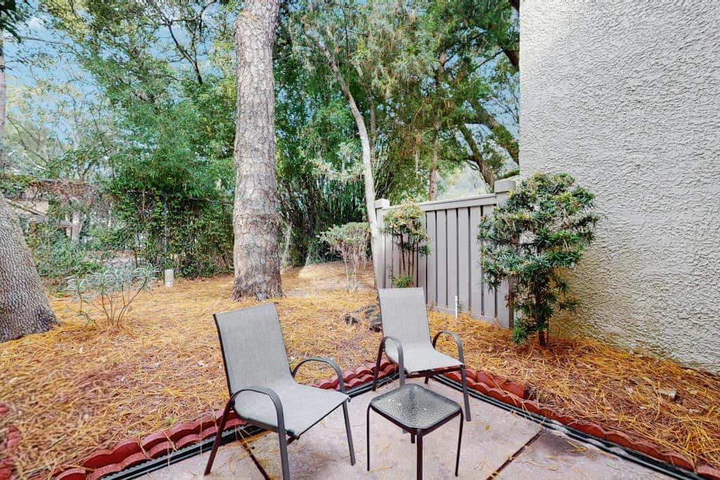Dog Friendly Condo with Fast WiFi, a Patio, & Shared Pool Walk to the Beach