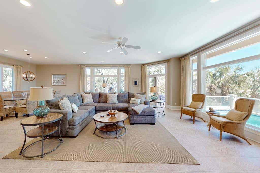 Prime location w/ private pool, elevator, game room and upper level water view 