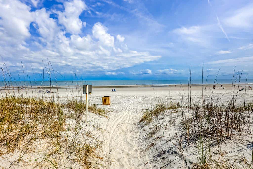 Prime location w/ private pool, elevator, game room and upper level water view 