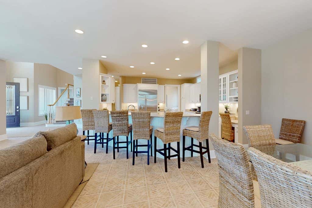 Prime location w/ private pool, elevator, game room and upper level water view 