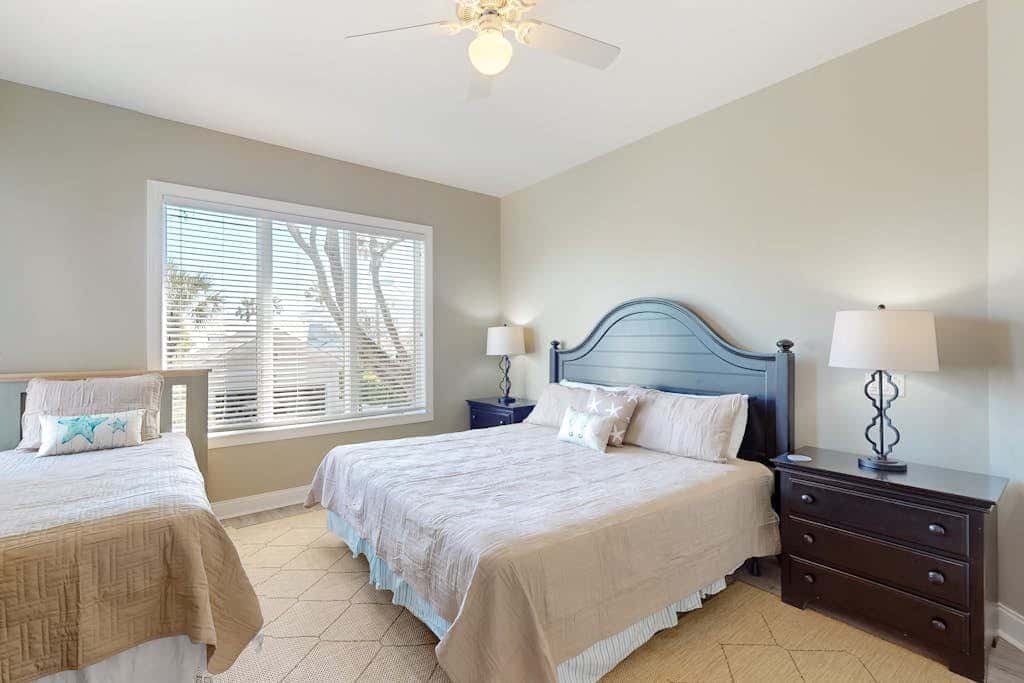Prime location w/ private pool, elevator, game room and upper level water view 