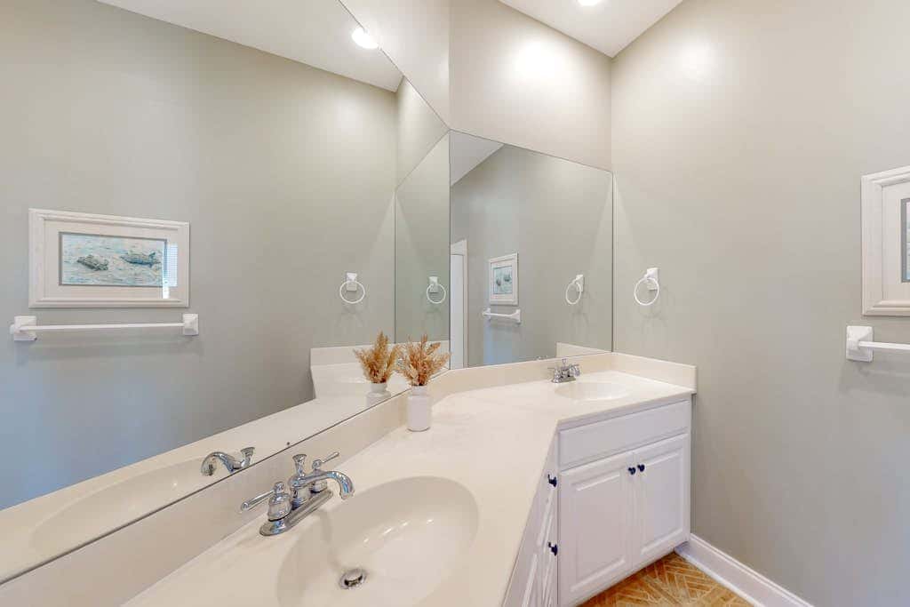Prime location w/ private pool, elevator, game room and upper level water view 