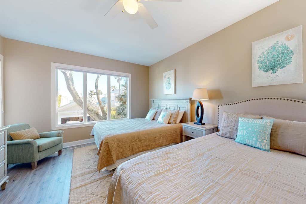 Prime location w/ private pool, elevator, game room and upper level water view 