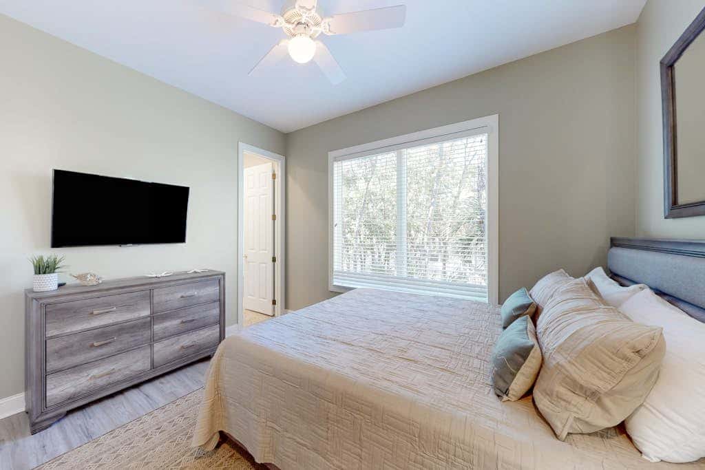 Prime location w/ private pool, elevator, game room and upper level water view 