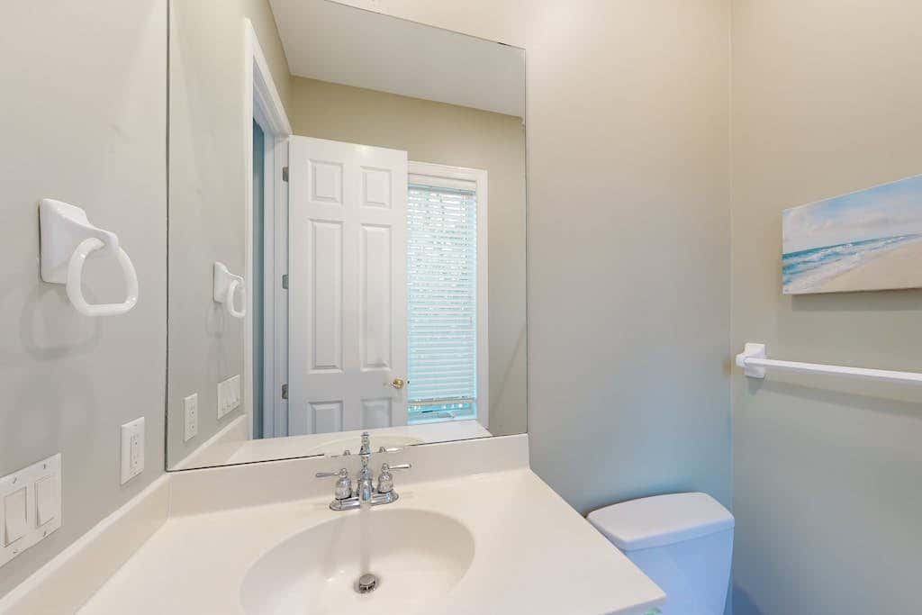 Prime location w/ private pool, elevator, game room and upper level water view 