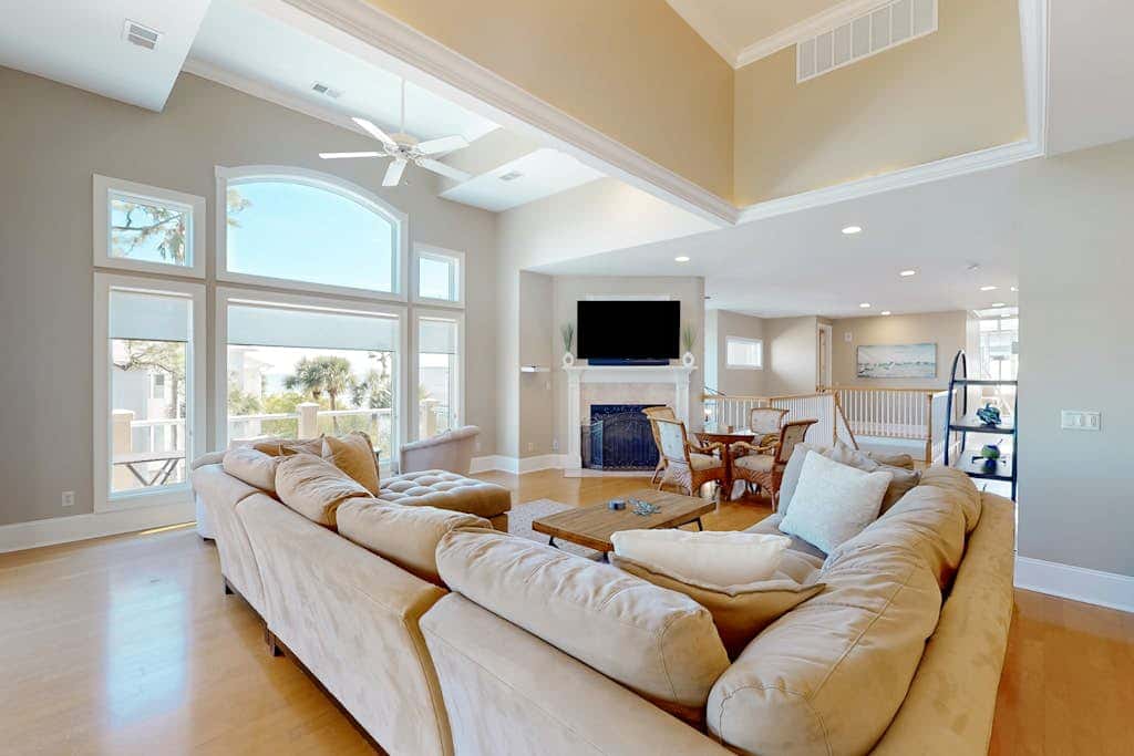 Prime location w/ private pool, elevator, game room and upper level water view 