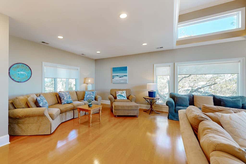 Prime location w/ private pool, elevator, game room and upper level water view 