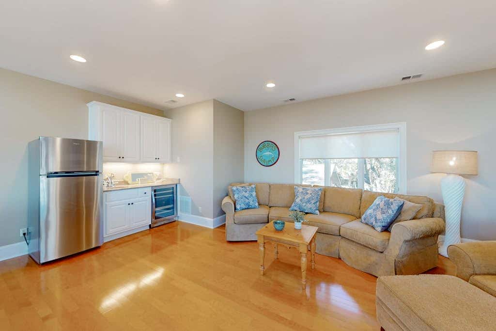 Prime location w/ private pool, elevator, game room and upper level water view 