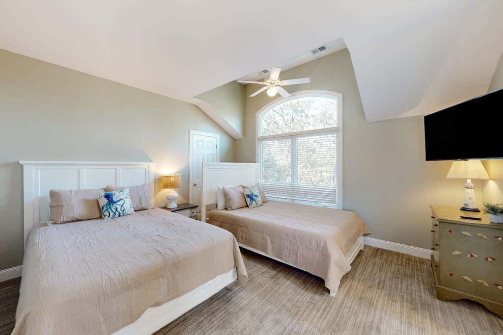Prime location w/ private pool, elevator, game room and upper level water view 