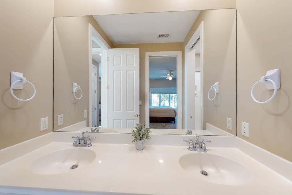 Prime location w/ private pool, elevator, game room and upper level water view 