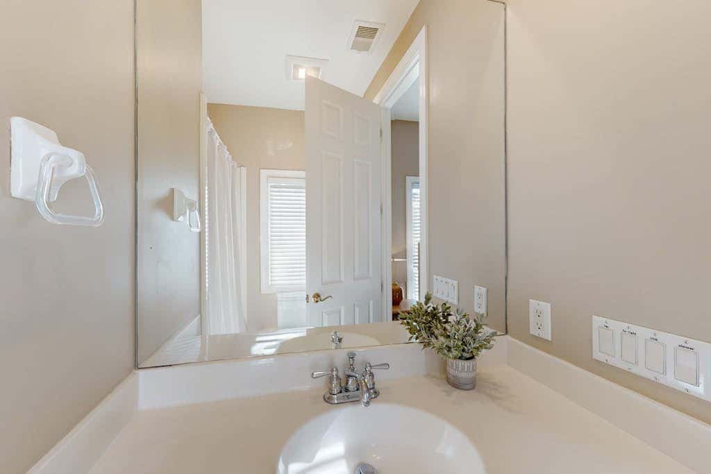 Prime location w/ private pool, elevator, game room and upper level water view 